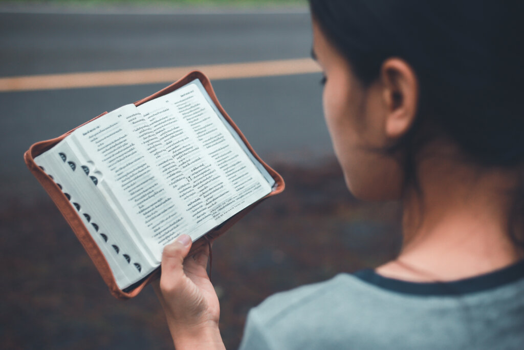 A woman reads the Bible